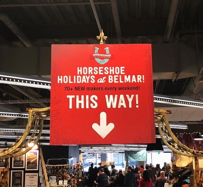 Horseshoe holidays at belmar 'this way' sign