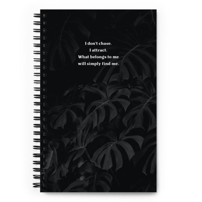 Beautiful spiral notebook that says I Don't Chase I Attract on the front