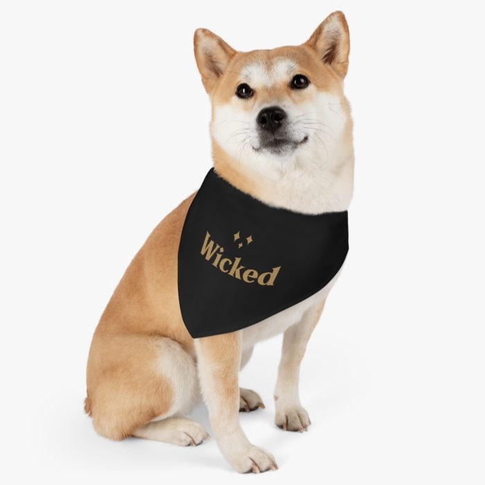 A pet bandana collar with the word Wicked on the front