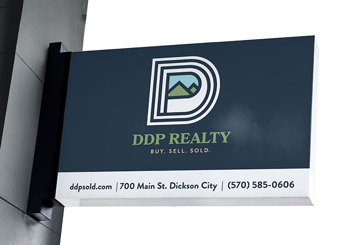 Branded office sign for DDP Realty.
